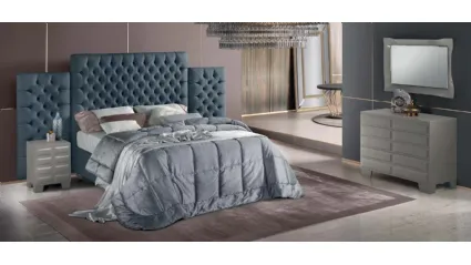 Letto dal design elegante con imponente testiera in tessuto trapuntato Tosca di Stilfar