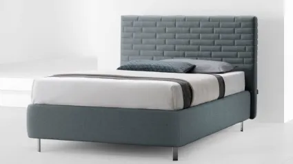 Letto Wall Thin Young a una piazza e mezza con testiera trapuntata dal design a mattoni di Stilfar Italia